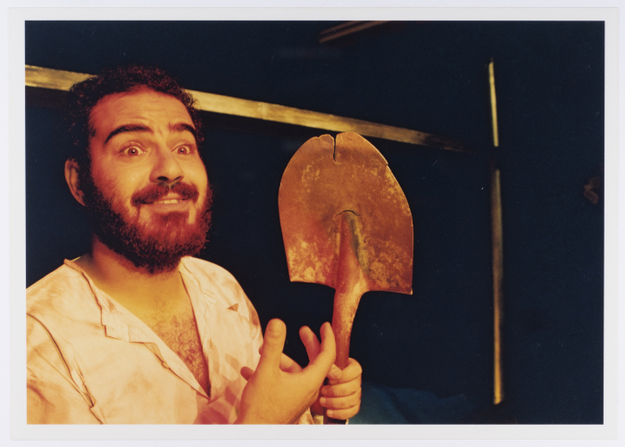 A Photograph of Amer Hlehel on Stage During the Theatrical Performance of 