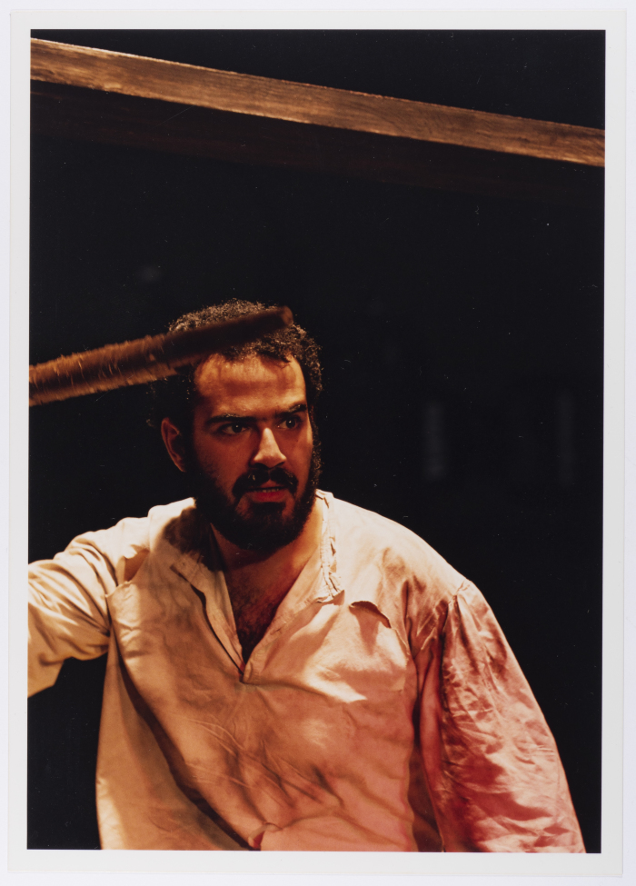 A Photograph of Amer Hlehel on Stage During the Theatrical Performance of 