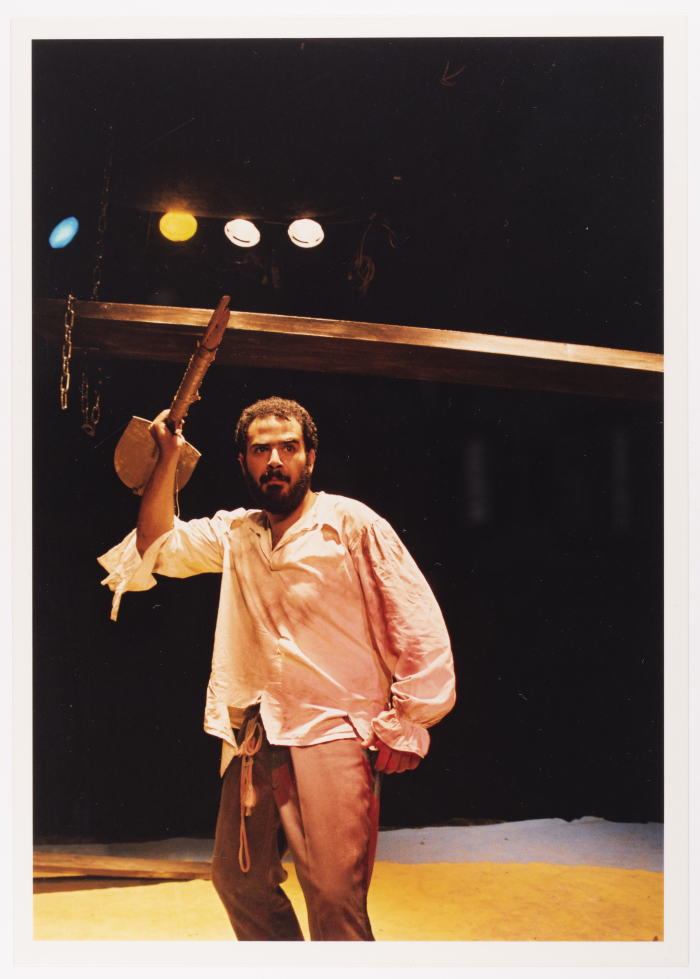 A Photograph of Amer Hlehel on Stage During the Theatrical Performance of 