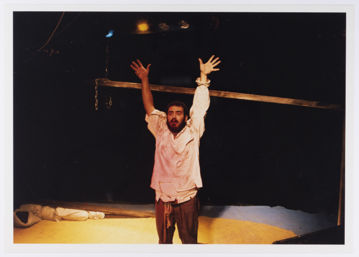 A Photograph of Amer Hlehel on Stage During the Theatrical Performance of 