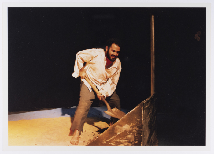 A Photograph of Amer Hlehel on Stage During the Theatrical Performance of 