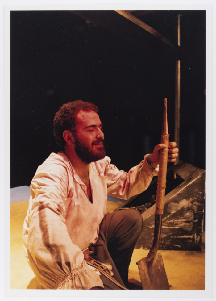 A Photograph of Amer Hlehel on Stage During the Theatrical Performance of 