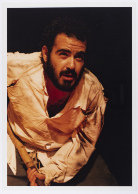 A Photograph of Amer Hlehel on Stage During the Theatrical Performance of "Diab"