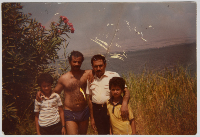 A Photograph of the Shaheed Abdullah Alawneh with his Sons and a Friend 