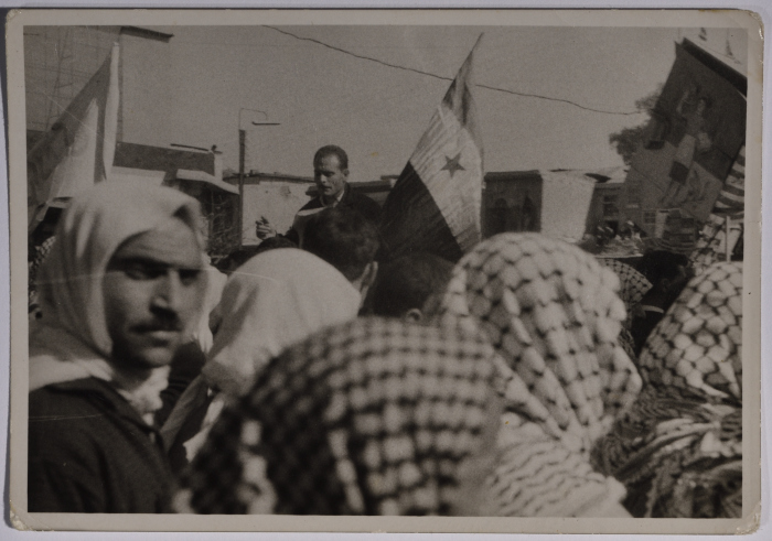 A protester cheering in a demonstration