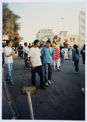 Clowns and Scouts Amidst a Crowd in Jerusalem