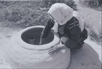 A Woman Making Taboon Bread in Kobar, Ramallah