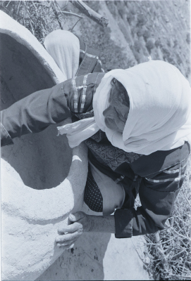 A Woman Making Taboon Bread in Kobar, Ramallah