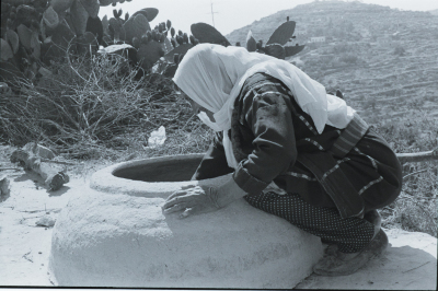 A Woman Making Taboon Bread in Kobar, Ramallah