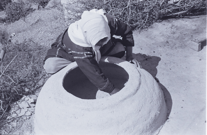 A Woman Making Taboon Bread in Kobar, Ramallah