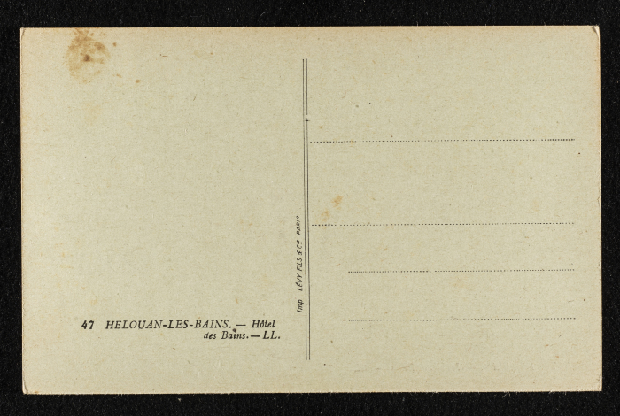 A Postcard Featuring a Photograph of a Hotel