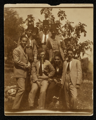 A Postcard Featuring a Photograph of Abdallah al-Khatib With Colleagues 