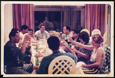 A Photograph of Sabreen Group Members at a Dinner with Friends in Tunisia, 1993