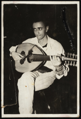 A Photograph of Wissam Murad Playing the Oud, 1995