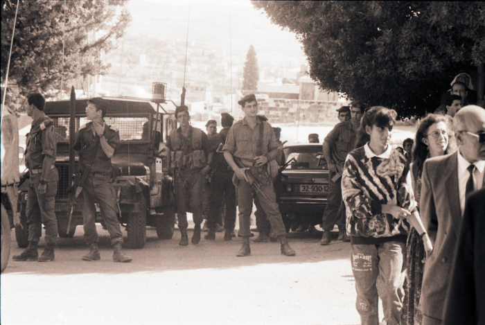 Men and Women Standing in front of the Israeli Occupation Soldiers in Beit Sahour, 1989 