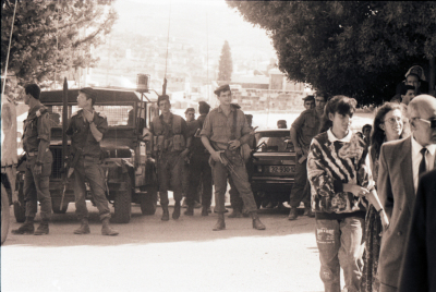 Men and Women Standing in front of the Israeli Occupation Soldiers in Beit Sahour, 1989 