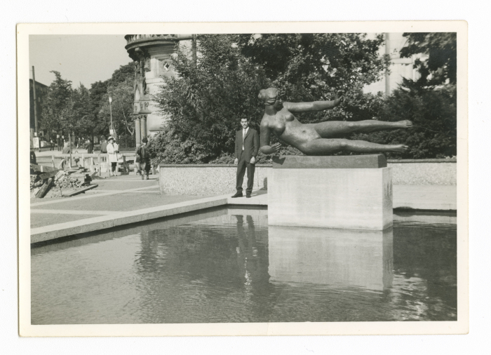 A Man Next to a Monument 
