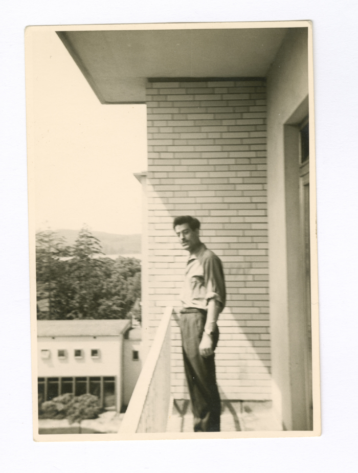 A Man Standing on a Hospital Terrace