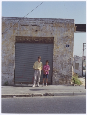 Siblings in Front of their Grandfather