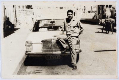 A Driver with Etimad Taxi Service. 