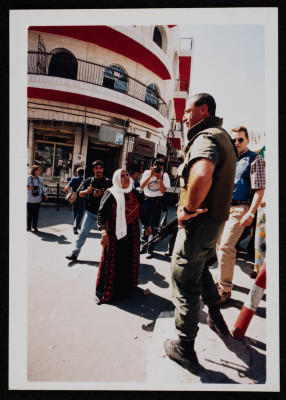 A Photograph of a Woman Facing an Israeli Soldier in Ramallah