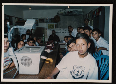 A Photograph of "a Group of Children on a Visit to Sanabel Center", 2003
