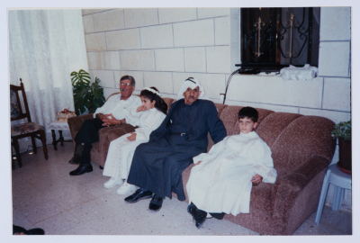 Andrawous Hanna and Issa Hanna with Their Grandchildren 