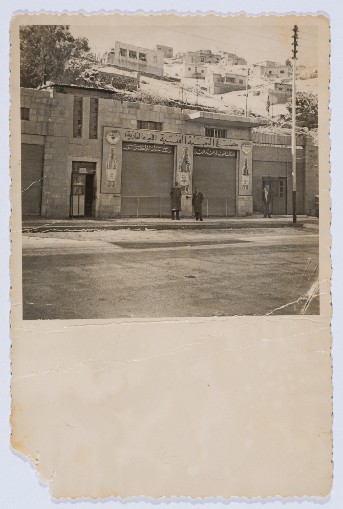 Andrawous Hanna with His Friend in front of Technical Packaging Co. in Amman 