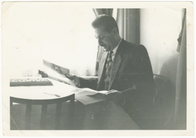 A Palestinian student reading the newspaper in Brittan
