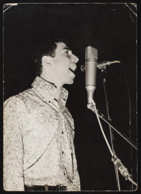 A Photograph of Ibrahim Ashrawy Singing at One of Al-Bara