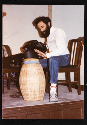 A Photograph of Emile Ashrawi On Stage at the Friends Girls School 