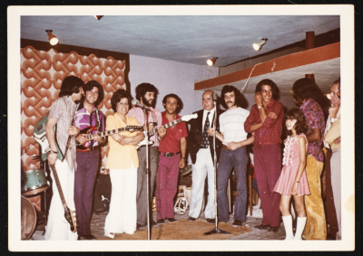 A Photograph of the Blooms and Mustafa Al-Kurd at Naom Restaurant, Ramallah 