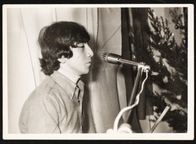 A Photograph of Emile Ashrawi Singing on New Year