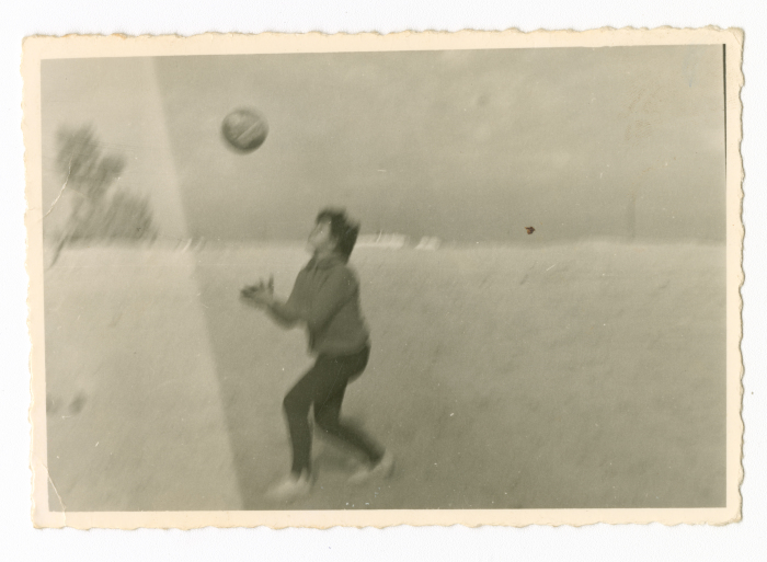 A Kid from al-Khatib Family Playing Football