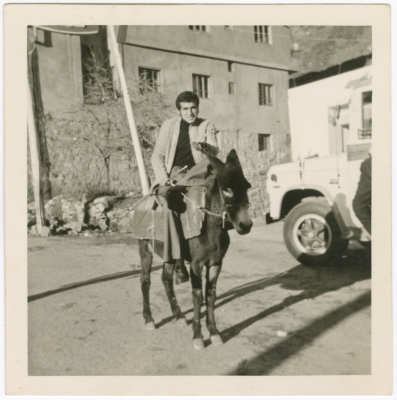 A Photograph of Hasan abu Khdair Riding a Donkey in Bsharri, Lebanon 