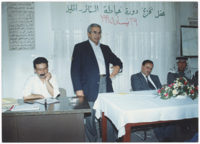 A Photograph of Hasan abu Khdair at the Curtains Sewing Course Graduation Ceremony, Hebron 