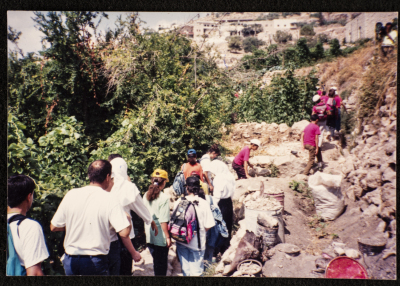 A Group of People in Artas 