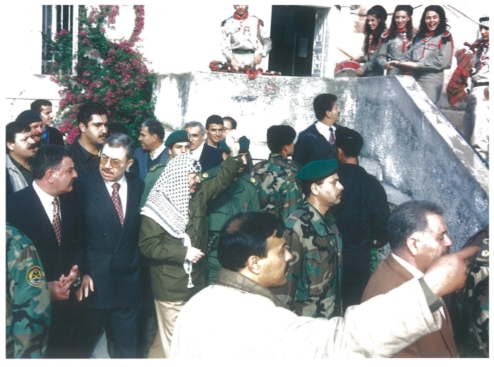 Yasser Arafat during a scout show performed by The First Ramallah Scout Group (Sareyyet Ramallah)