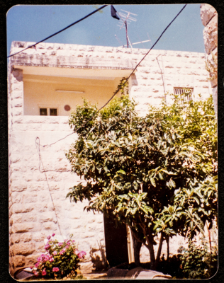 A Black Flag on a Rooftop in Artas in Mourning of Abu-Jehad 