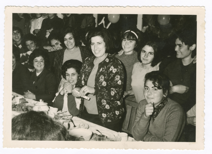 A Photograph of Ghada Rashid with Teachers and Students 