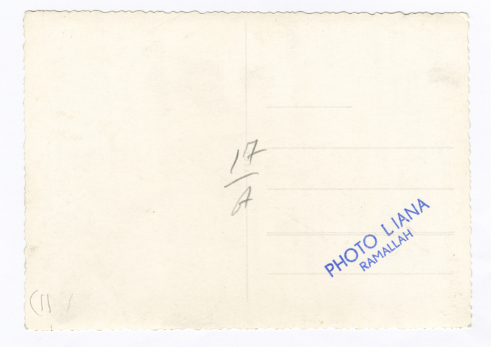 A Photograph of Ghada Rashid with Teachers and Students 