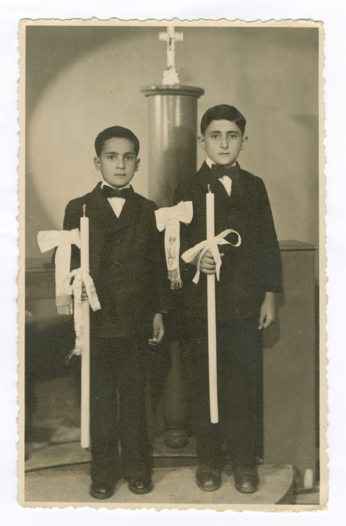 A Photograph of Nicholas and Yusef Ali During Their First Communion