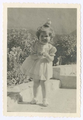 A Photograph of a Girl in a Garden