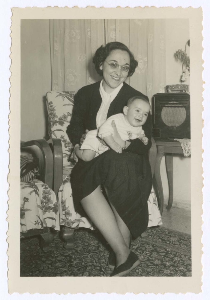 Dumia Sakakini Holding a Baby