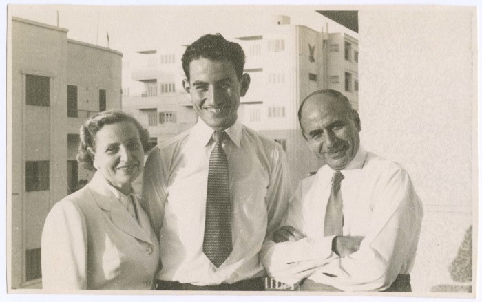 A Photograph of a Woman and Two Men
