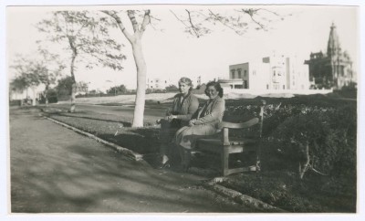 Domia Khalil Sakakini Seated at a Park with a Woman 