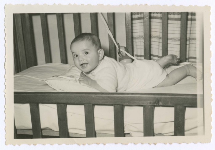 A Photograph of a Child in His Crib