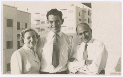 A Photograph of a Woman and Two Men