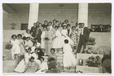 Domia Sakakini Amidst Graduates and Teacher of the Friends School