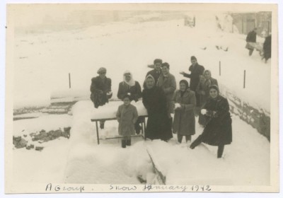 A Photograph of People Standing in the Snow, 1942